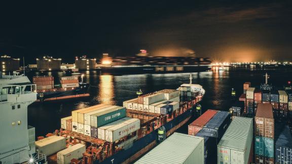 Container ships at night