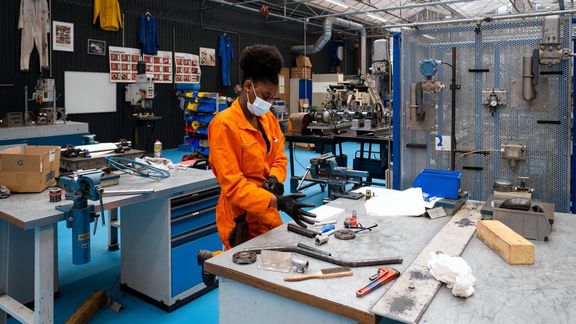 An employee is busy in the workshop