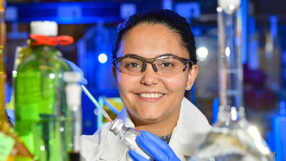 A woman works in the lab