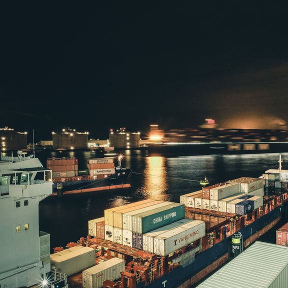 Container ships at night